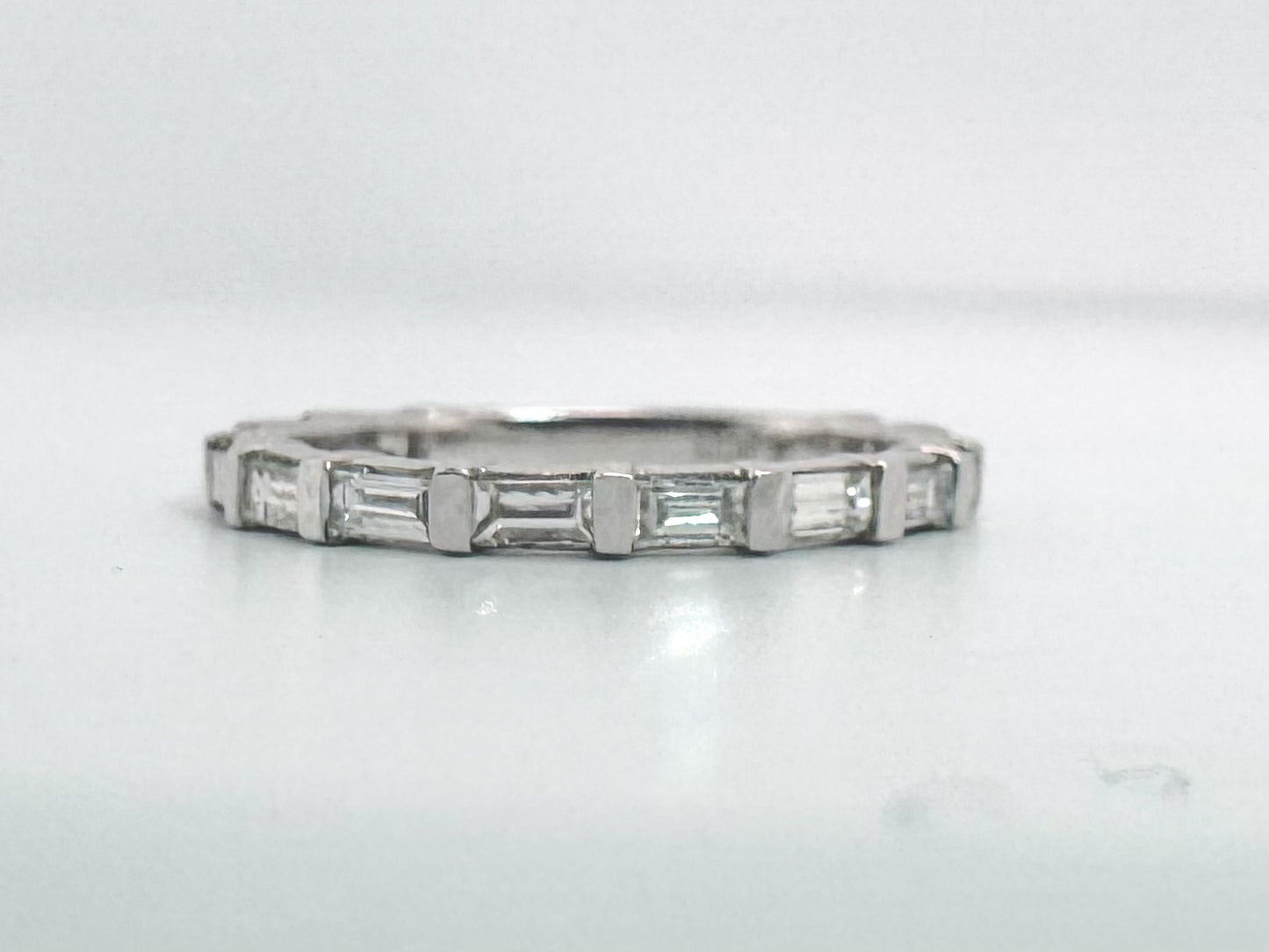 14k, White gold, .60 carats, natural baguette diamond band.