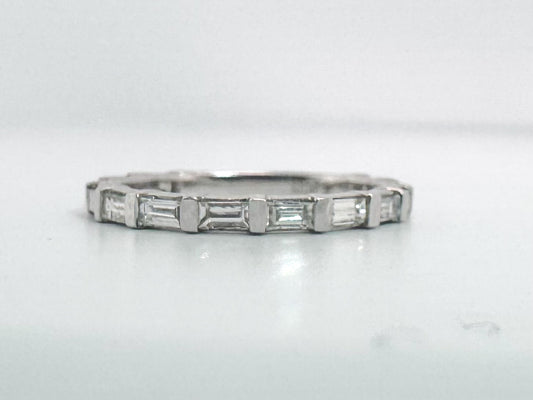 14k, White gold, .60 carats, natural baguette diamond band.