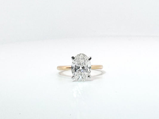 14K, 2.54 carat lab grown oval solitaire. VVS2 F IGI certified
