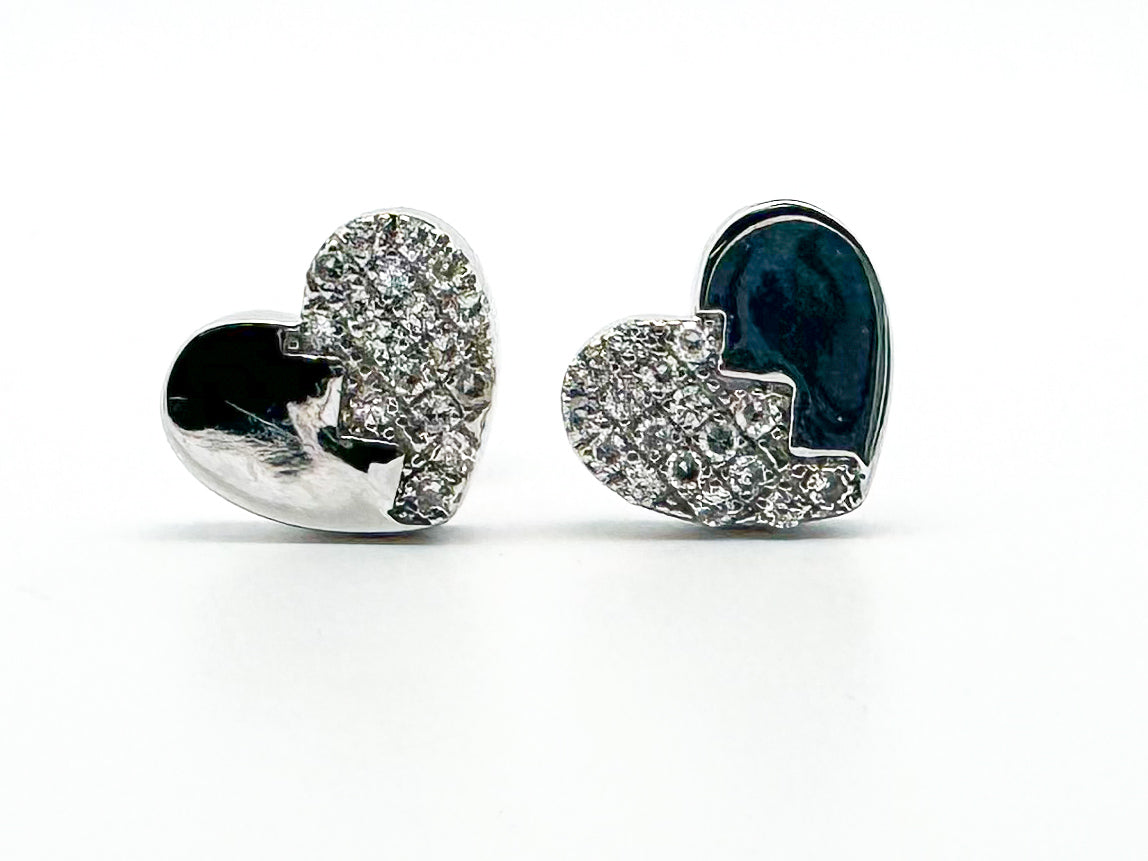 14k, white gold diamond heart shaped earrings. .15 diamond total weight