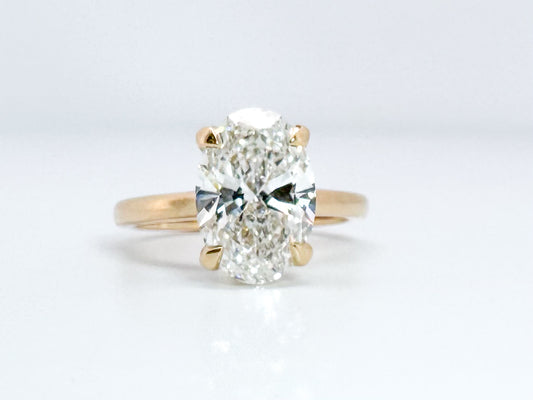 14K, Yellow gold 3.03 lab grown oval VS1 E with hidden halo. IGI Certification