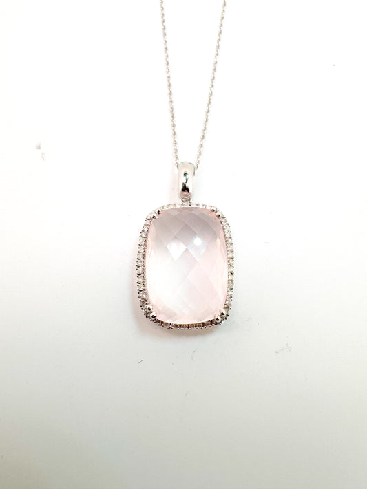 14k, white gold 12.0 carat rose quartz with .20 side diamonds. Pendant
