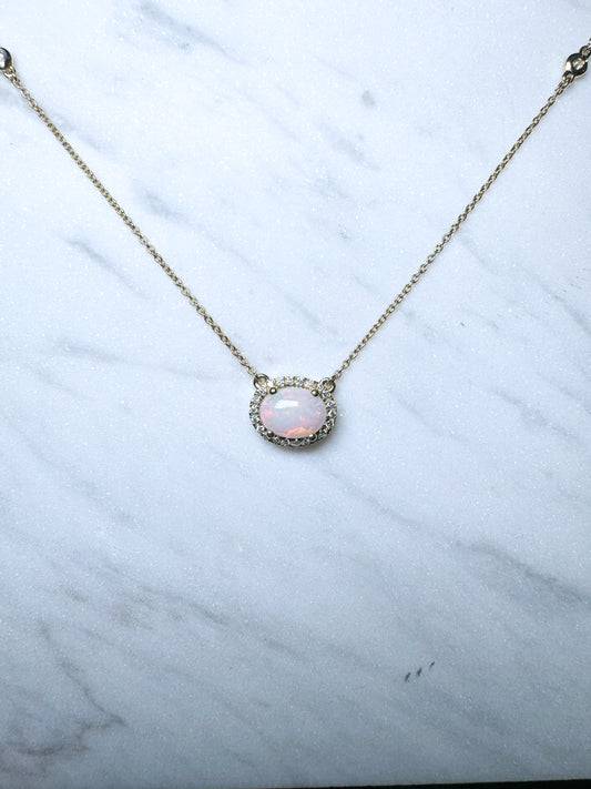 14K,yellow gold, .27 dtw natural diamond and opal pendant.