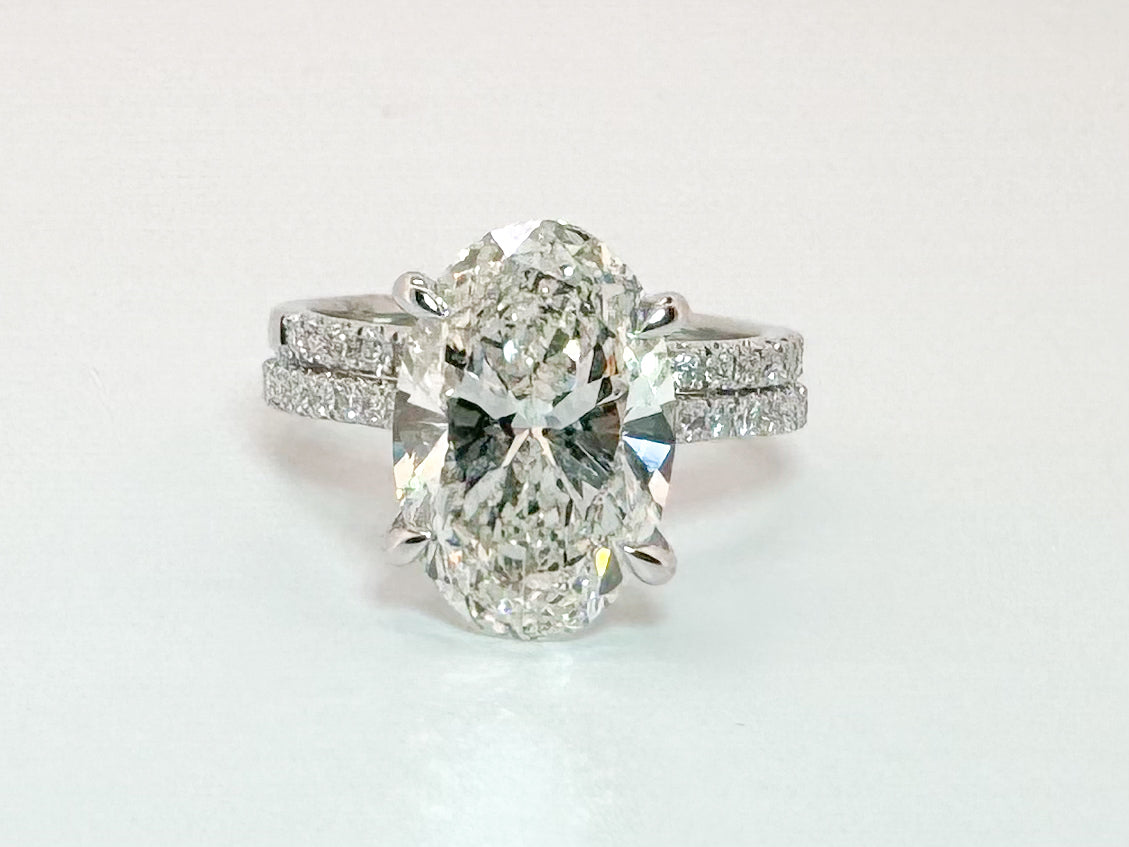 14k, white gold 5.55 carat lab grown oval diamond wedding set. VS2 G IGI certified