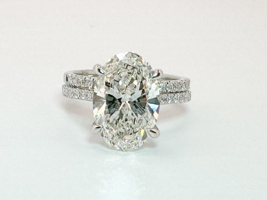 14k, white gold 5.55 carat lab grown oval diamond wedding set. VS2 G IGI certified