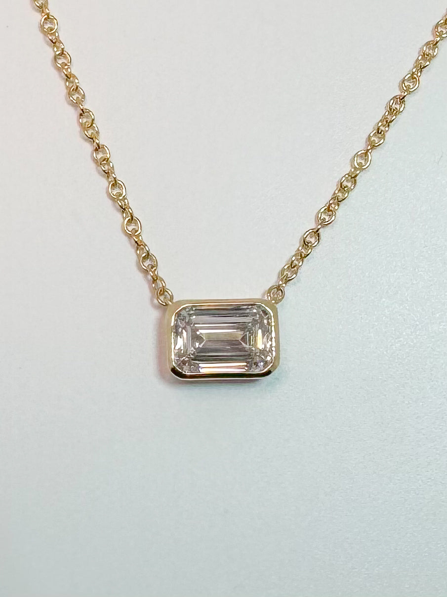 14K, yellow gold, .80 lab grown emerald cut diamond pendant.