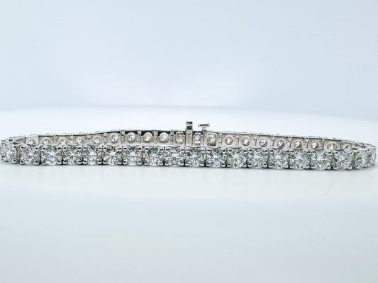 14k white gold 10.08 carat diamond tennis bracelet.