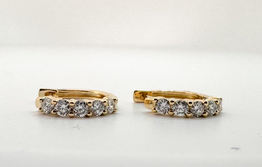 14ky .50 carat total weight, diamond huggie earrings.