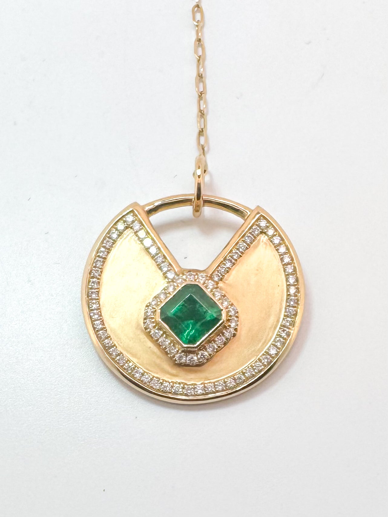 Custom "one of a kind"14k yellow gold natural emerald and diamond pendant.