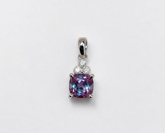 14k, White gold, created Alexandrite and natural diamond pendant.