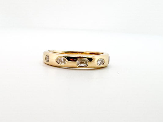 14k, Yellow gold, flush set, multi diamond shape band. .50 diamond total weight.