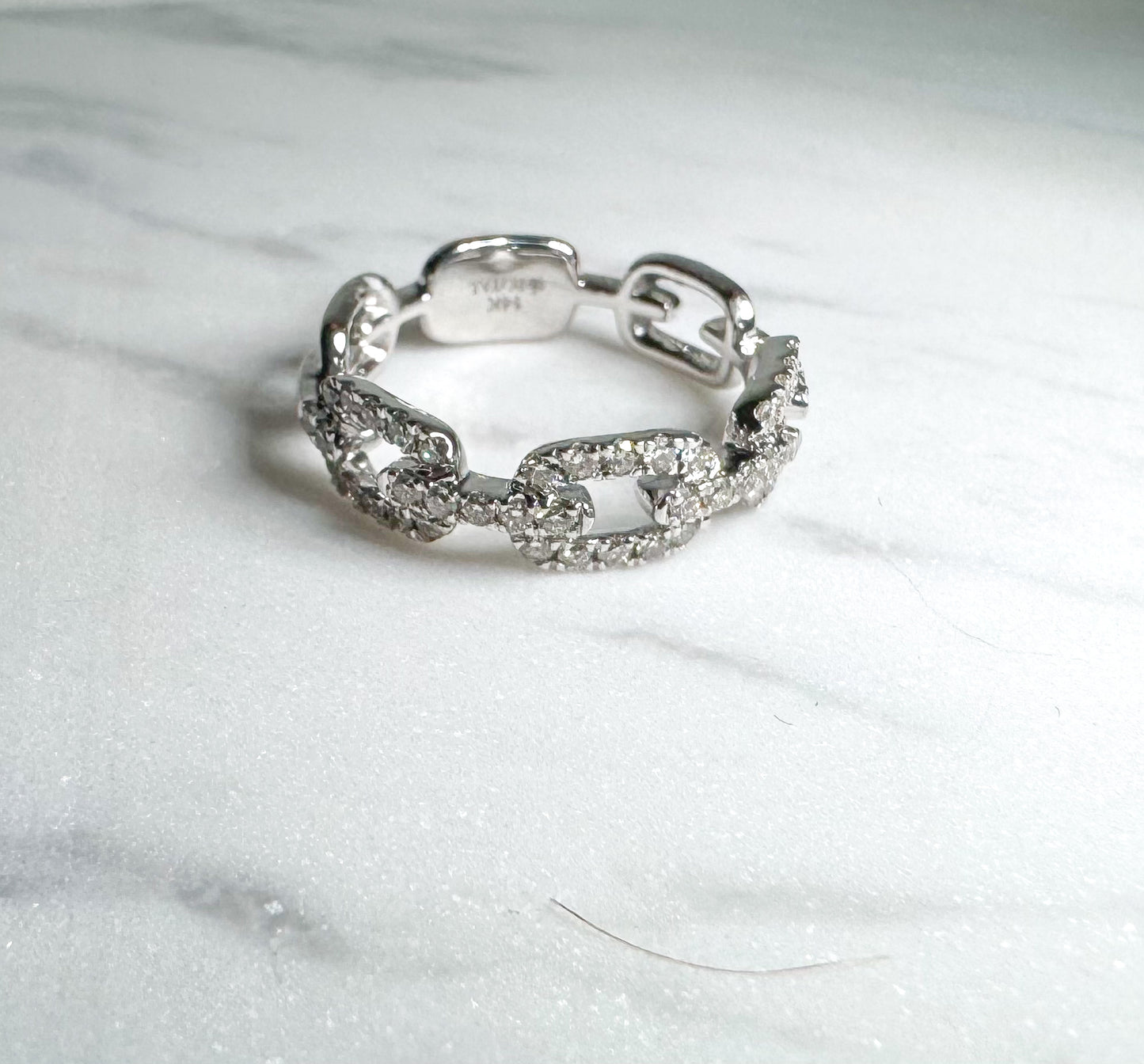 14k, white gold chain link diamond band. .50 diamond total weight.