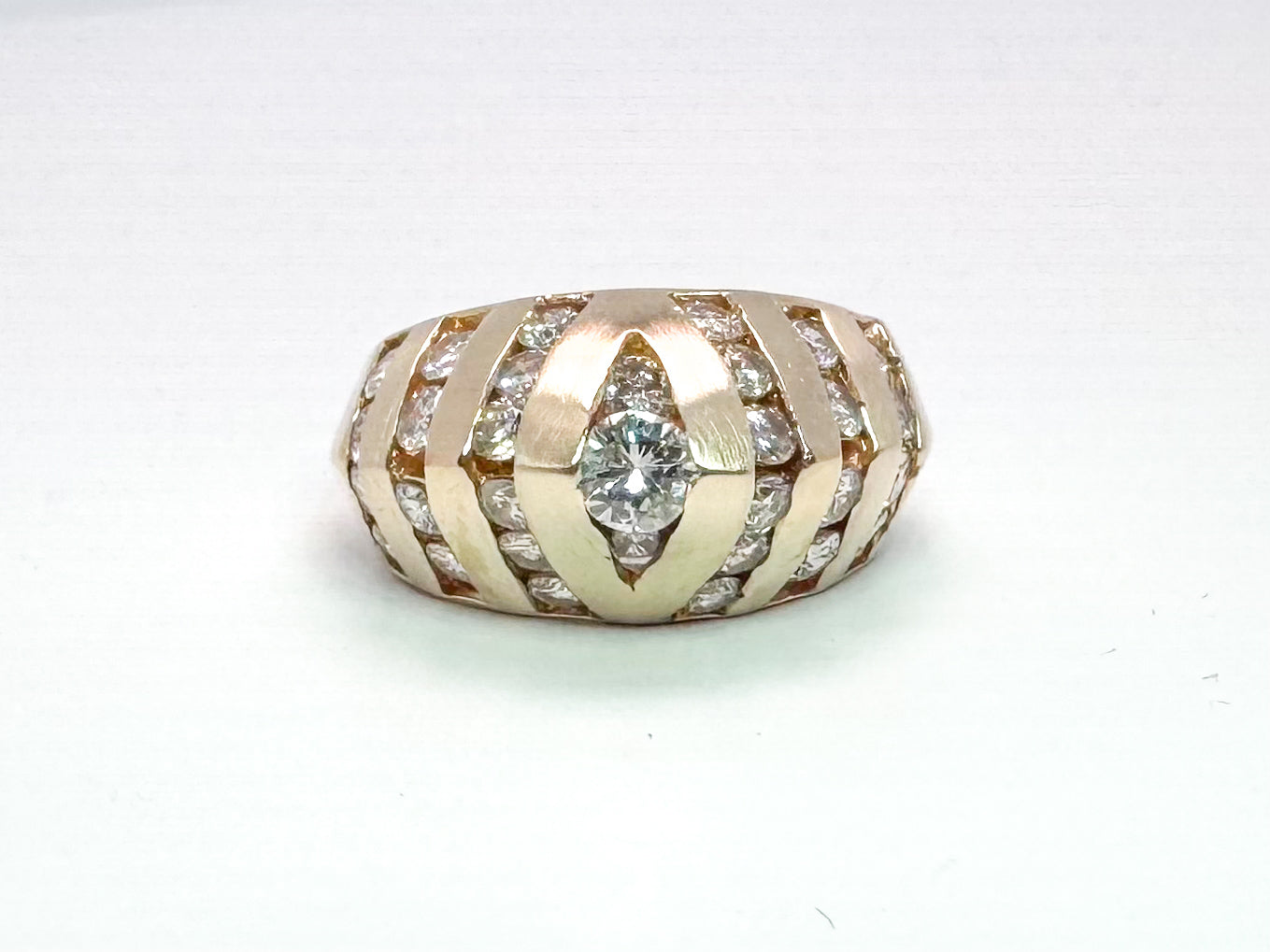14k yellow gold estate diamond domed ring. 1.00 carat total weight.