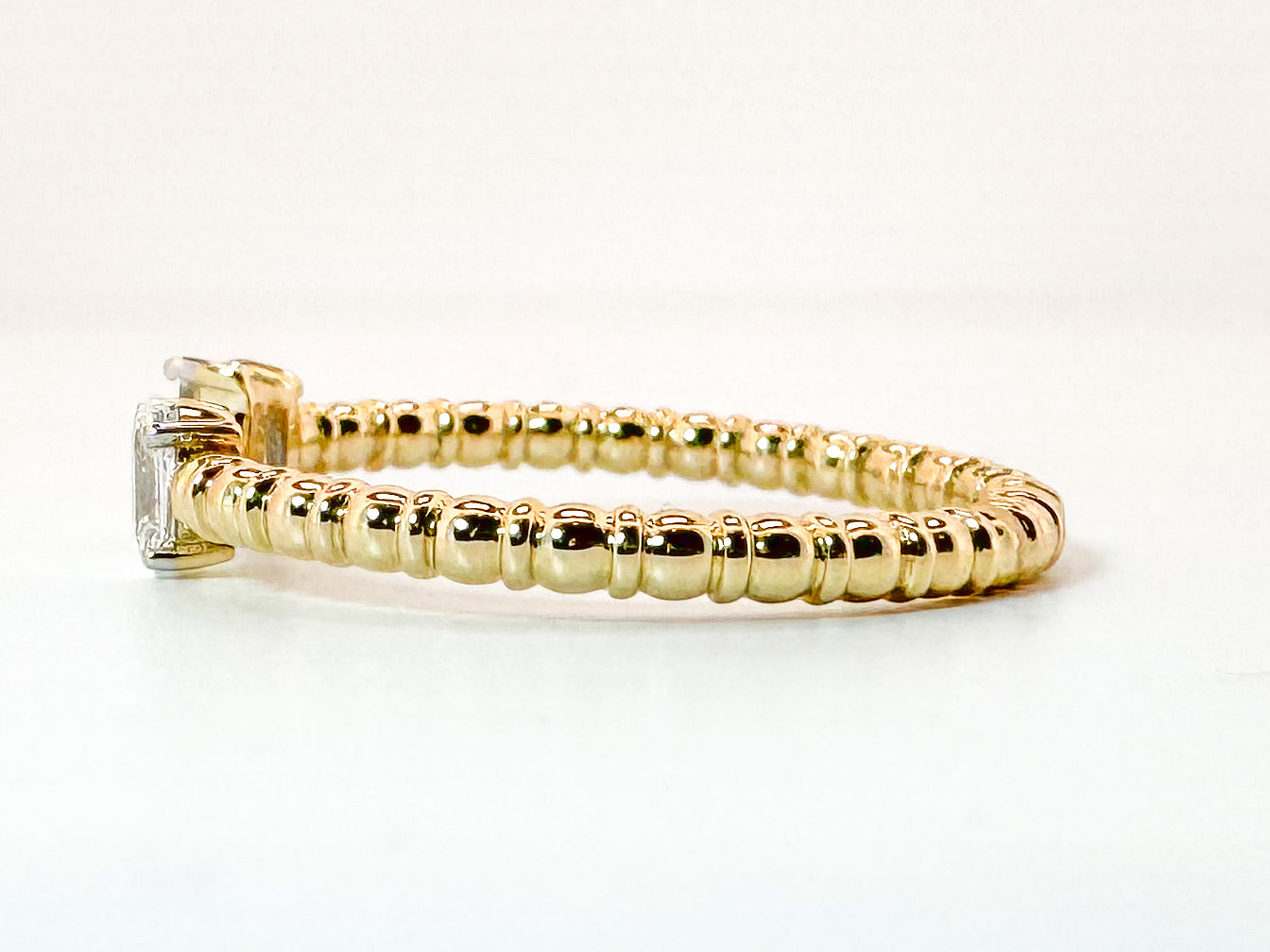 14K, Yellow gold .32 total weight, two diamond ,oval and baguette diamond fashion/ wedding band