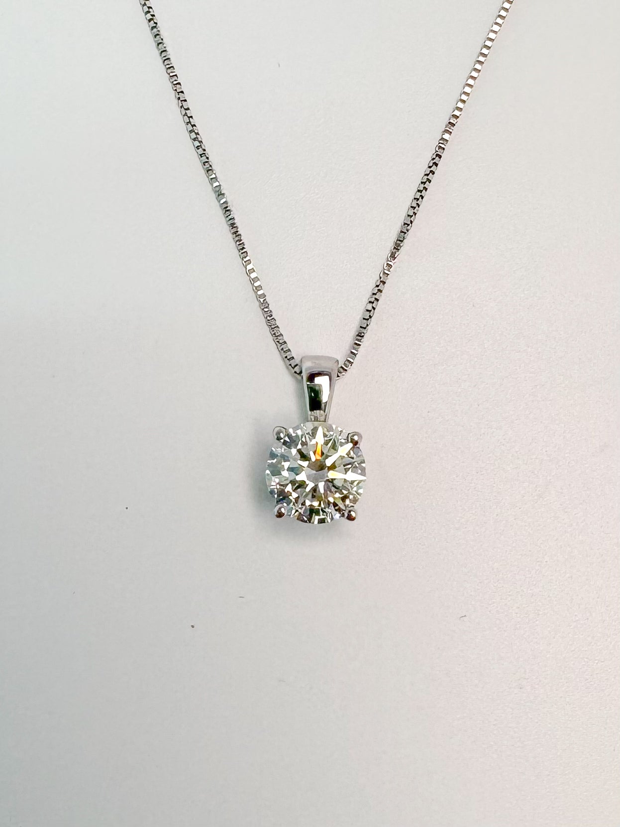 14k white gold, lab grown diamond solitaire pendatn with hidden halo 1.00 carat total weight