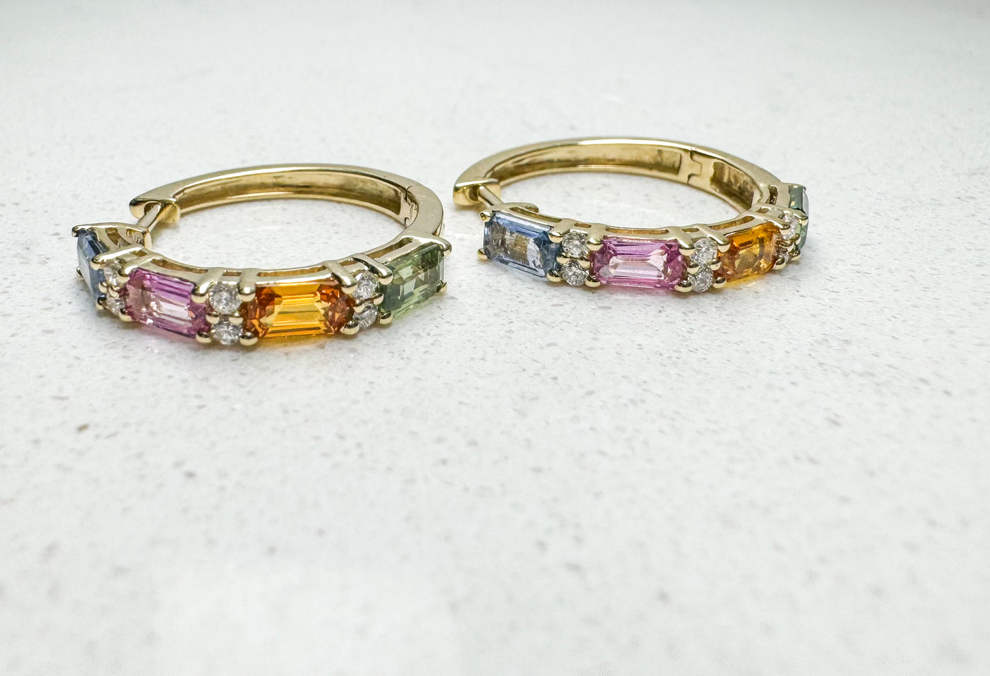 14ky, rainbow sapphire and diamond hoop earrings.