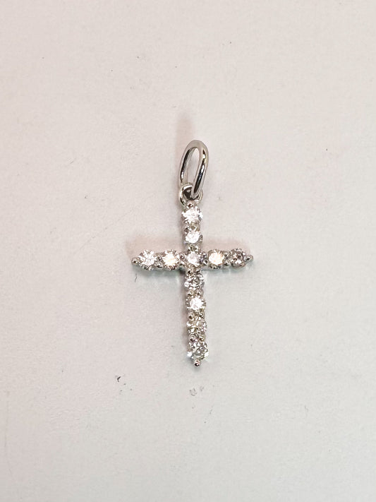 14k, White gold .19 diamond total weight, mini cross pendant.