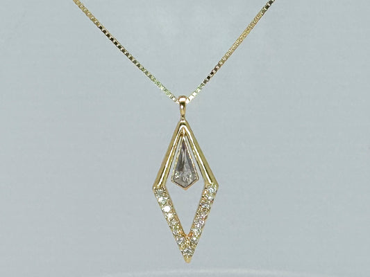 14k, yellow gold, custom diamond pendant  .50 natural kite shaped diamond set with .30 carats of side diamonds.