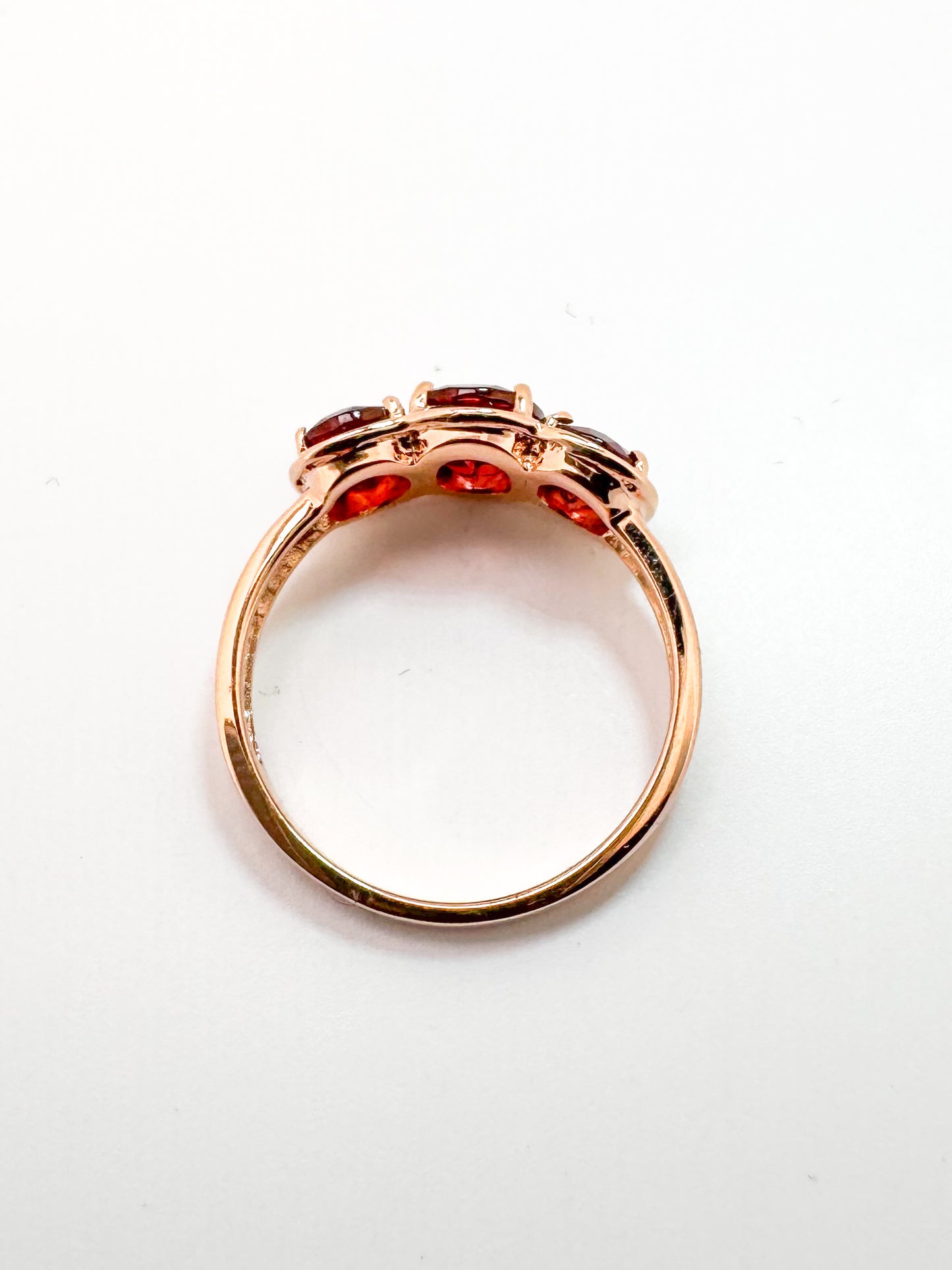 14K, Rose gold, three stone garnet ring. 3.25 carats