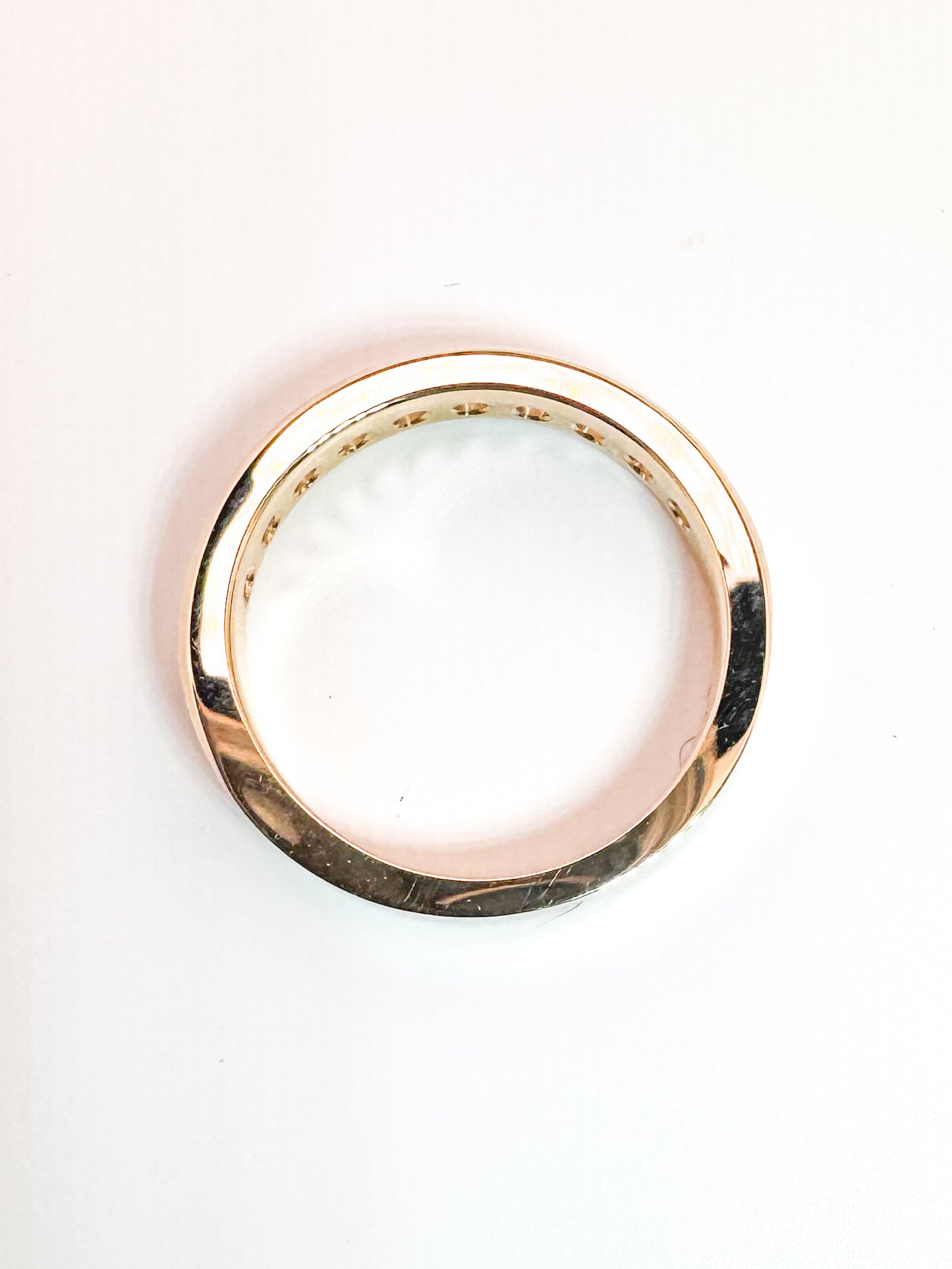 14K, yellow gold, .75 carat total weight, channel set band.