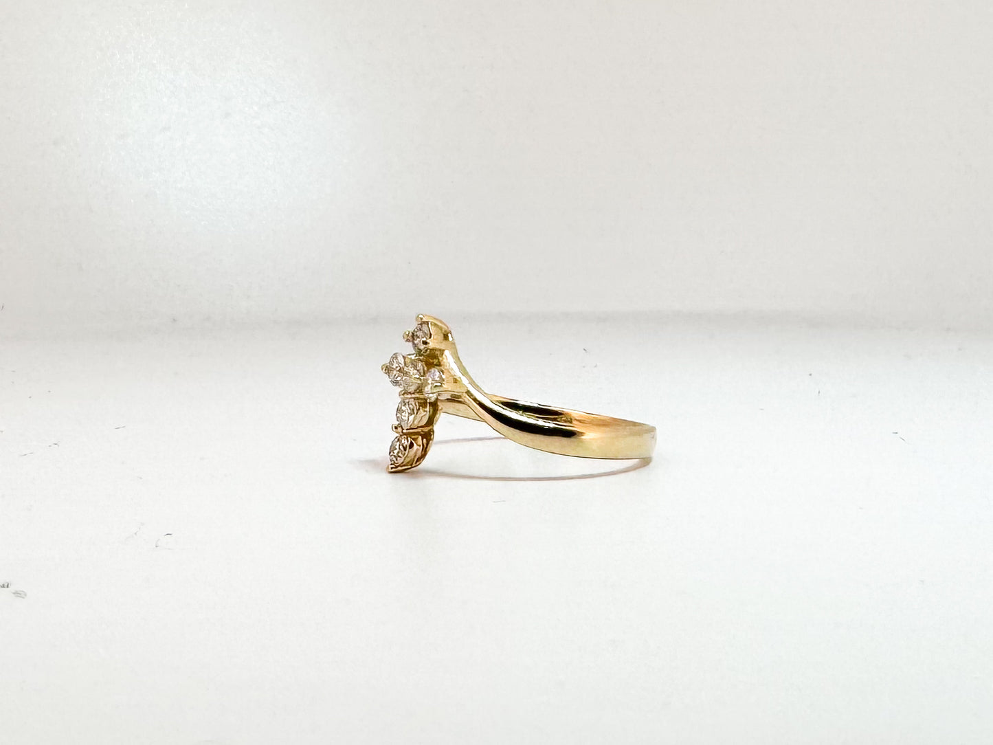 14K, Yellow gold, .43 diamond total weight, natural diamond cross ring.