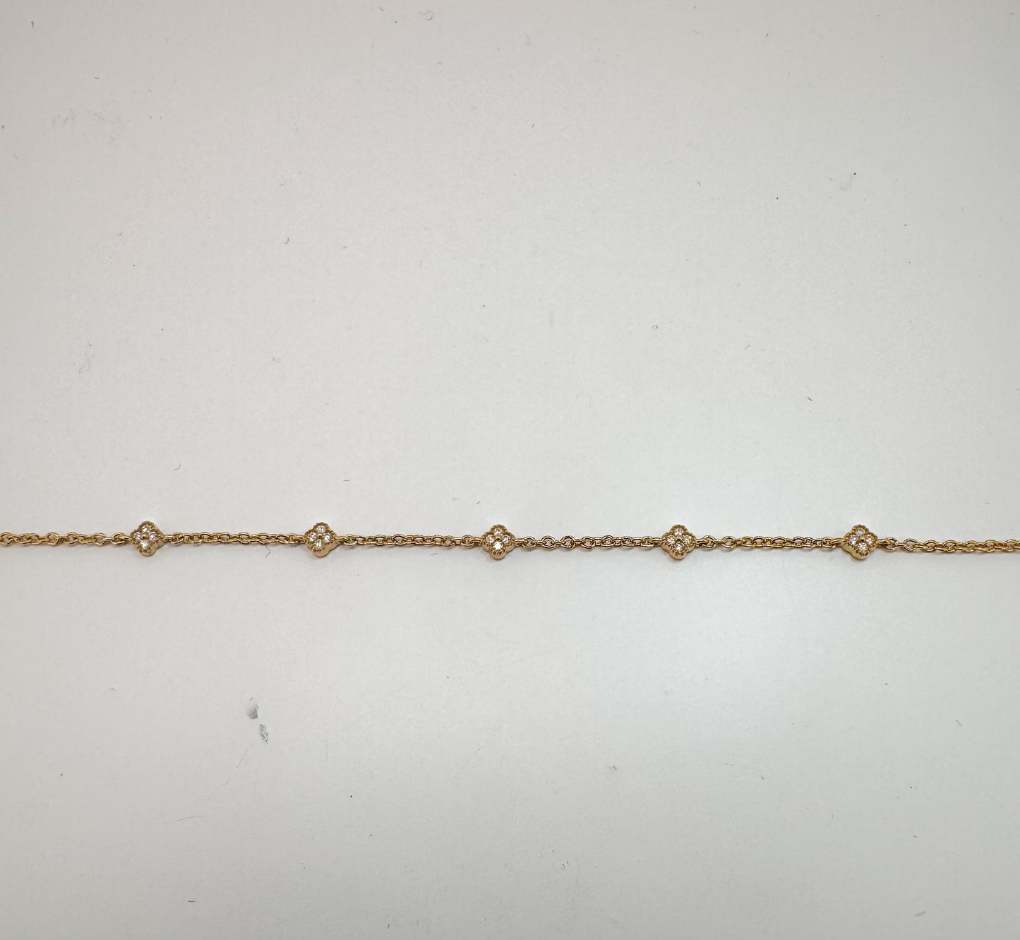 14K, yellow gold petite diamond, alahambra tennis bracelet. 7.5"