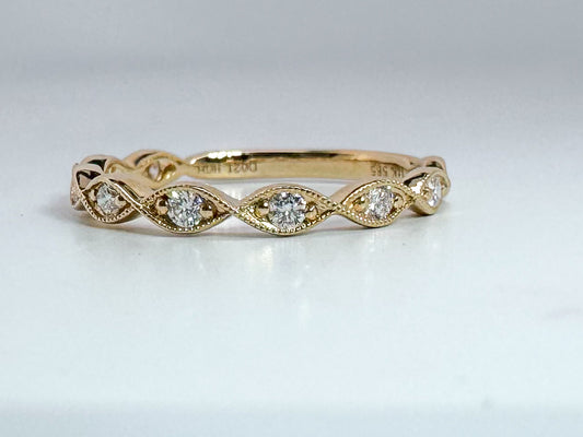 14k, yellow gold scalloped .21 carat, natural diamond band.