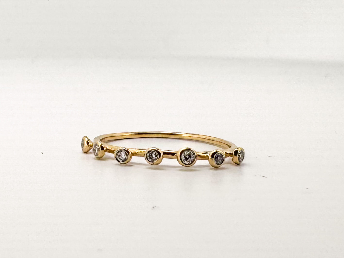 14K, Yellow gold, bezel set diamond wedding or stacker band.