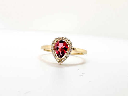 14K, Yellow gold, .75 carat, Rhodolite garnet ring with .12 carats of side diamonds.