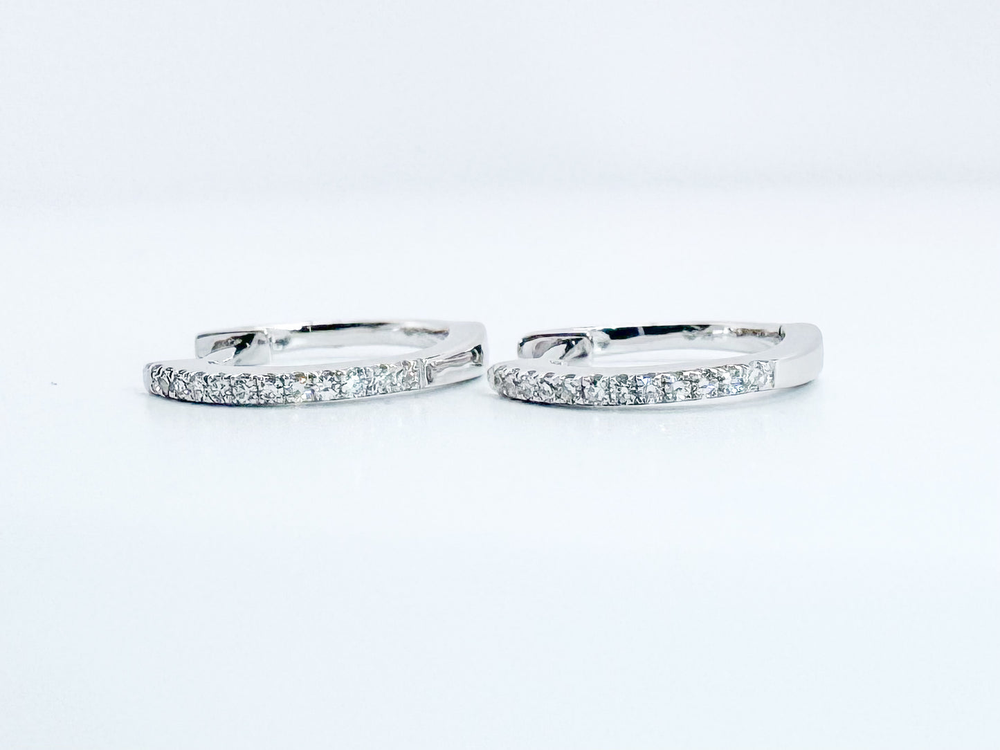 14K, white gold , .08 carat total weight