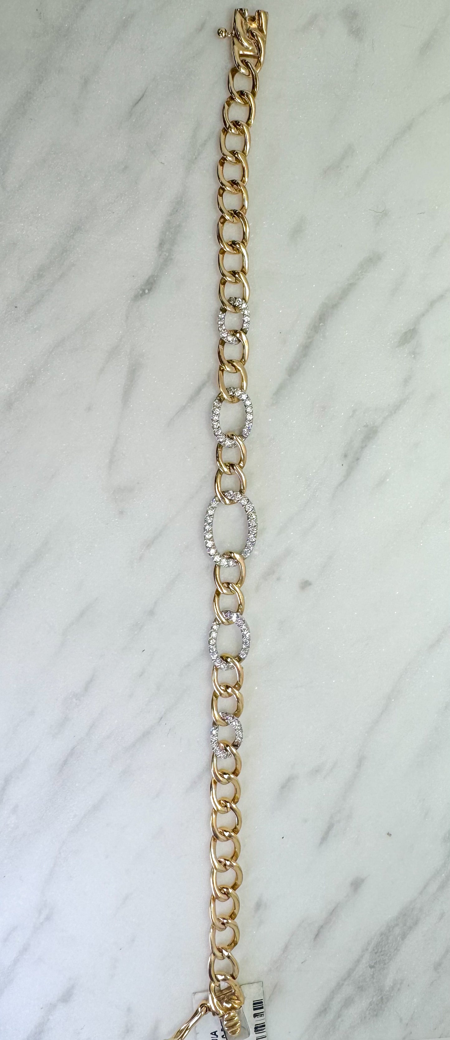 14k two tone  gold diamond link bracelet.