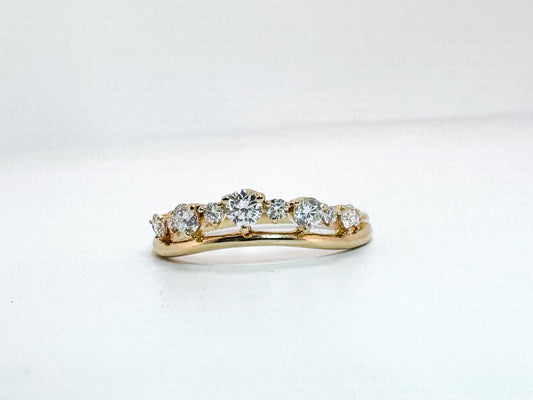 14k, yellow gold.40 diamond total weight, curved wedding band.