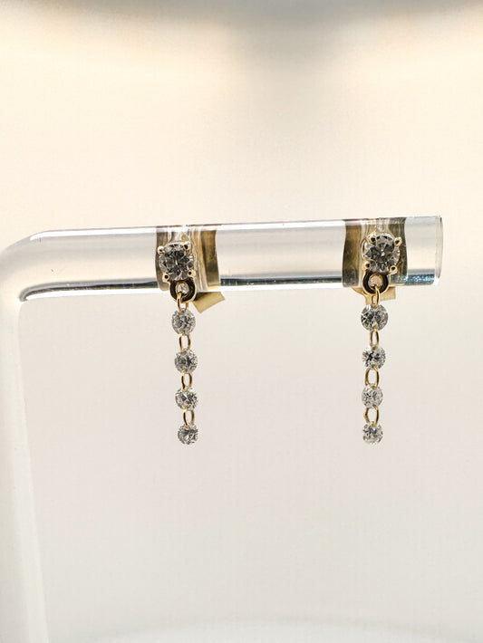 14ky .33 dtw drilled diamond dangle earrings.