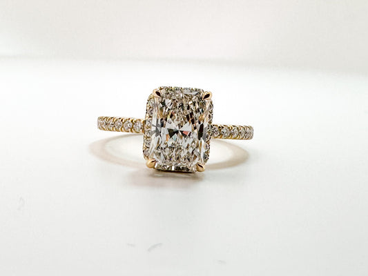14K, yellow gold, 2.07 carat radiant cut lab grown diamond, set with .39 carats of side diamonds. IGI certified