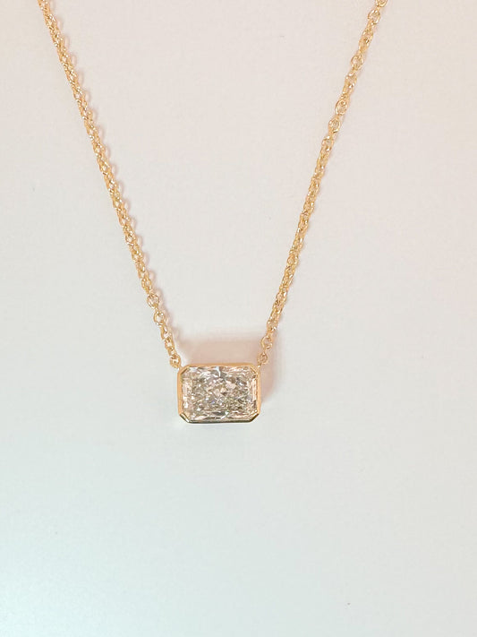 14K, yellow gold 2.15 VS1 E Radiant cut diamond solitaire necklace. IGI certified