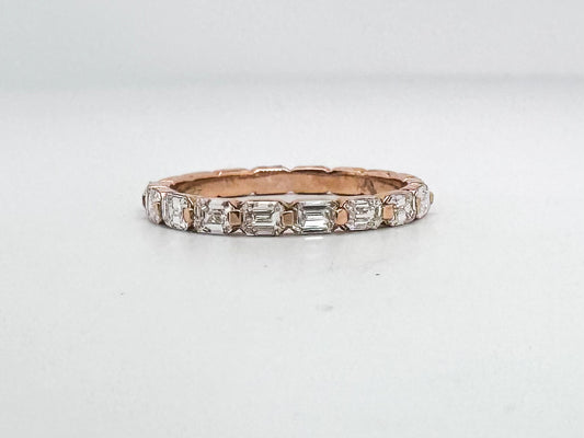 14K, Rose gold, .68 diamond total weight, emerald cut diamond band.