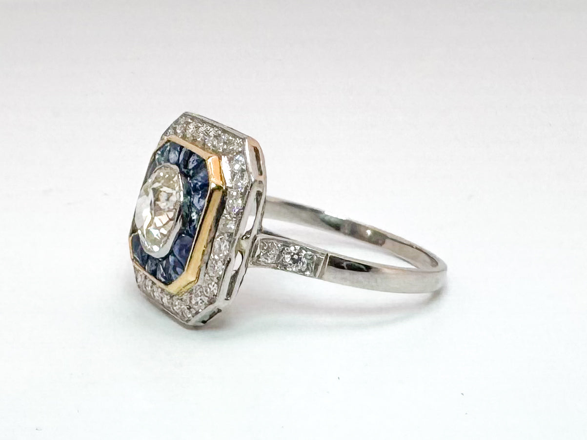 Platinum & 18k vintage 1.00 carat center old mine cushoin cut with 1.90 natural sapphire and .40 ct side diamonds