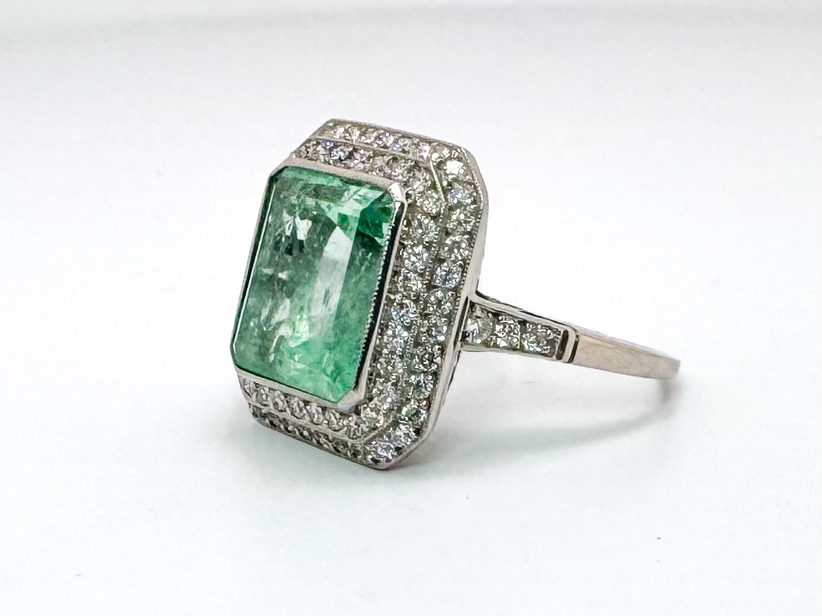 Platinum 6.50 carat, natural mint green emerald set with .85 carats of natural side diamonds. ART DECO