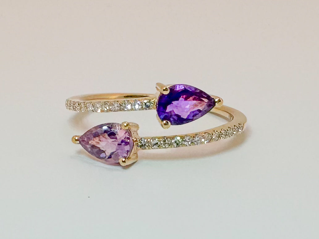 14k, yellow gold, .60 carat total weight Amethyst with .15 diamond total weight side diamond, open concept fashion ring.