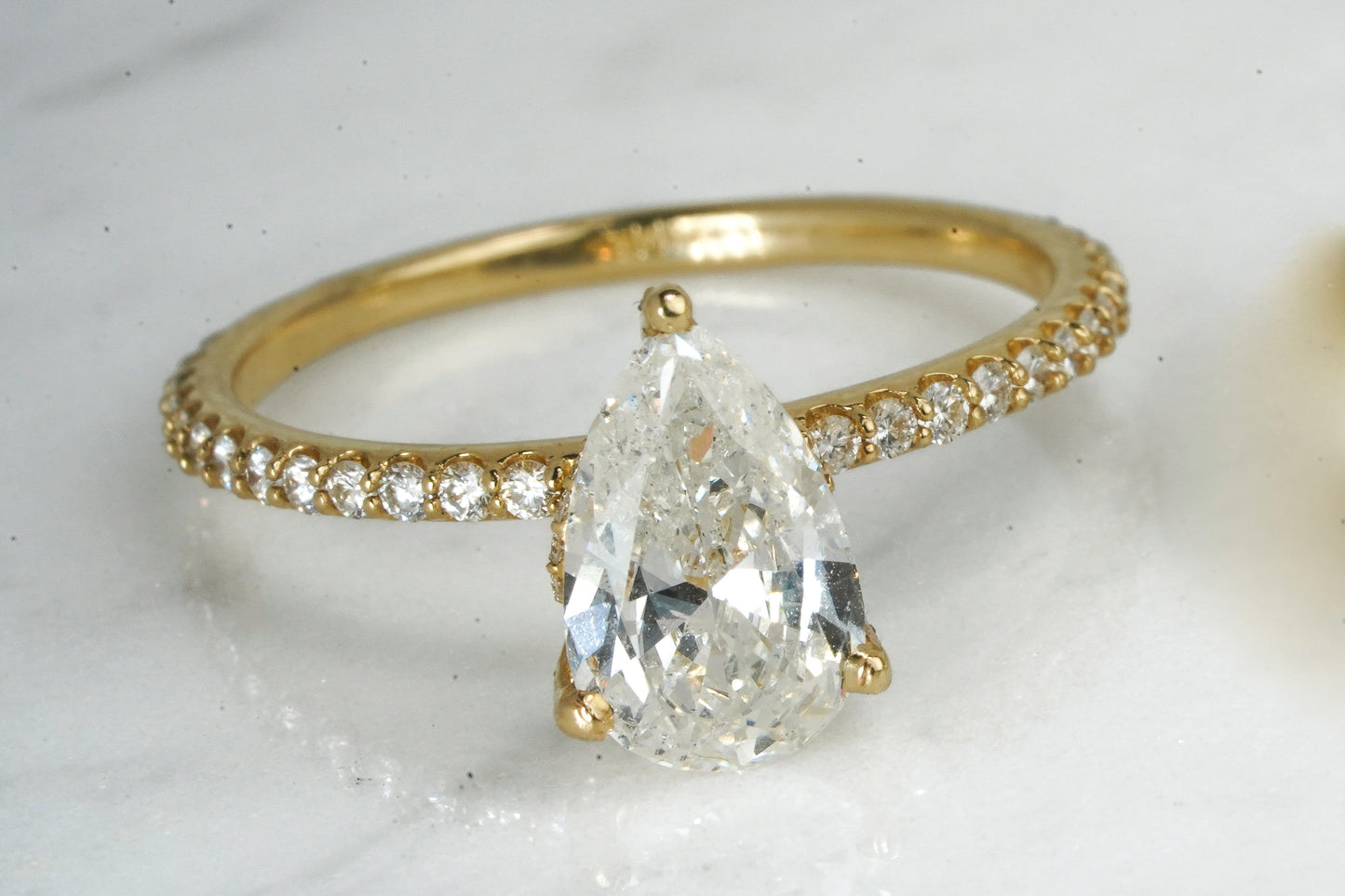 1.26ct Natural Pear Diamond with 1/2ctw sides