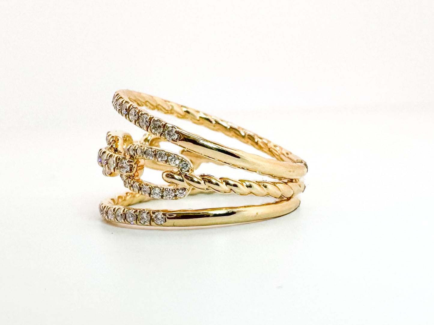 14K,Yellow gold three band link diamond ring. .51 diamond total weight