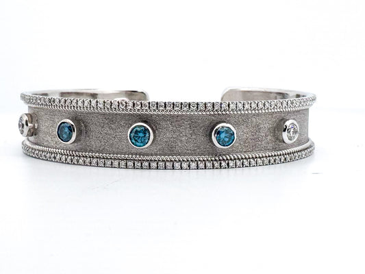 18k, White gold S.Georgios desighner diamond bangle bracelet. 2.45 carats.