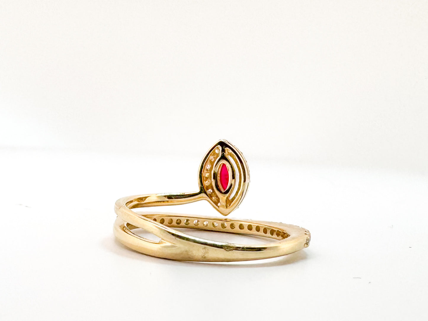 14K, yellow gold, .32 carat natural ruby with .18 carats of side diamonds.