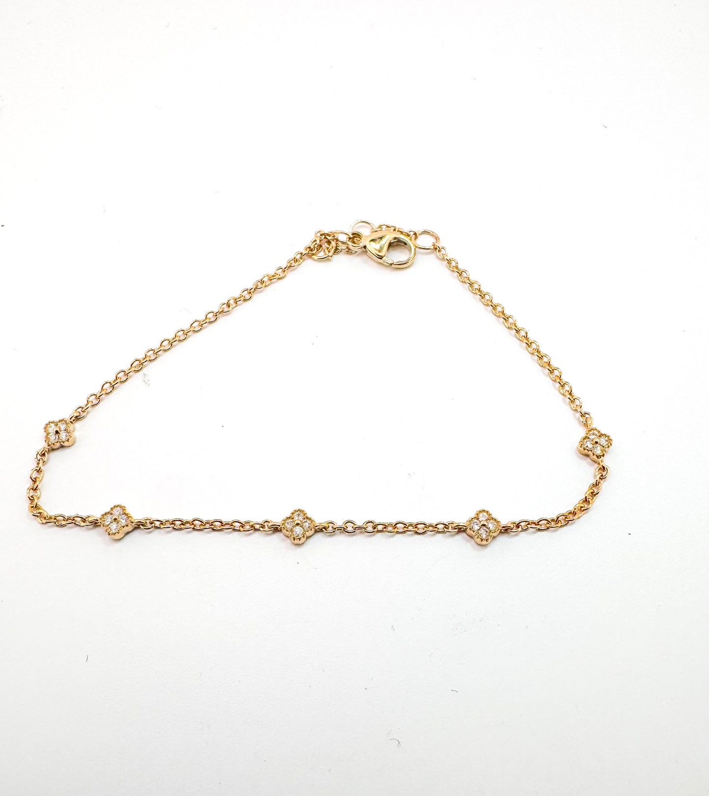14K, yellow gold petite diamond, alahambra tennis bracelet. 7.5"