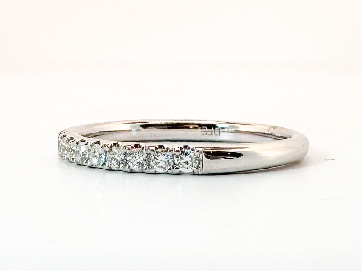 14K, White gold .35 diamond totsal weight wedding band. VS2 G