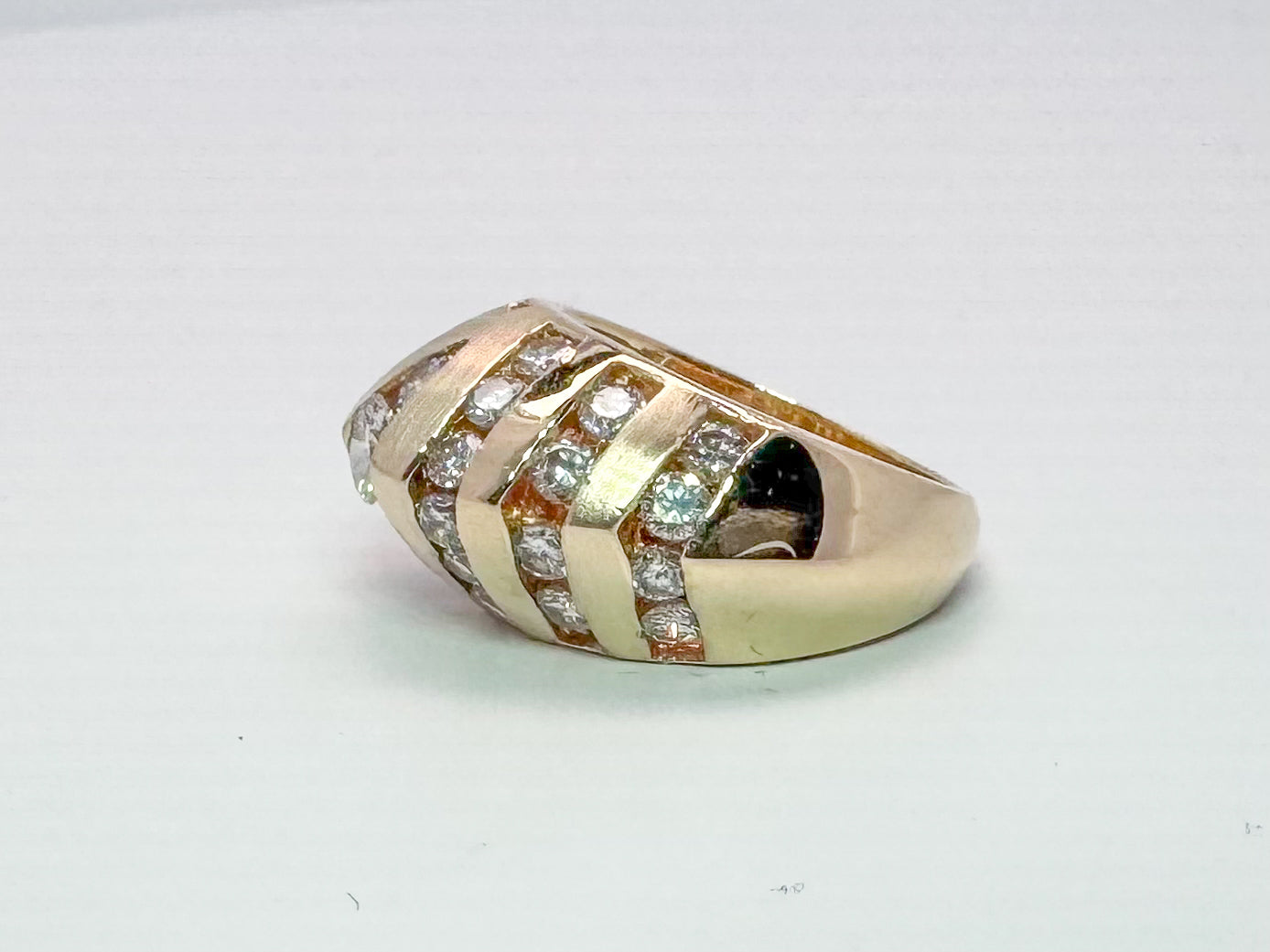 14k yellow gold estate diamond domed ring. 1.00 carat total weight.