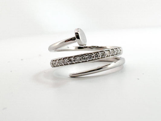 14K, white gold, diamond nail ring. .20 carat total diamond weight.