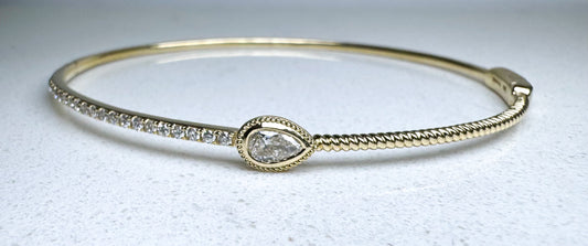 14K yellow gold pear and round diamond bangle bracelet