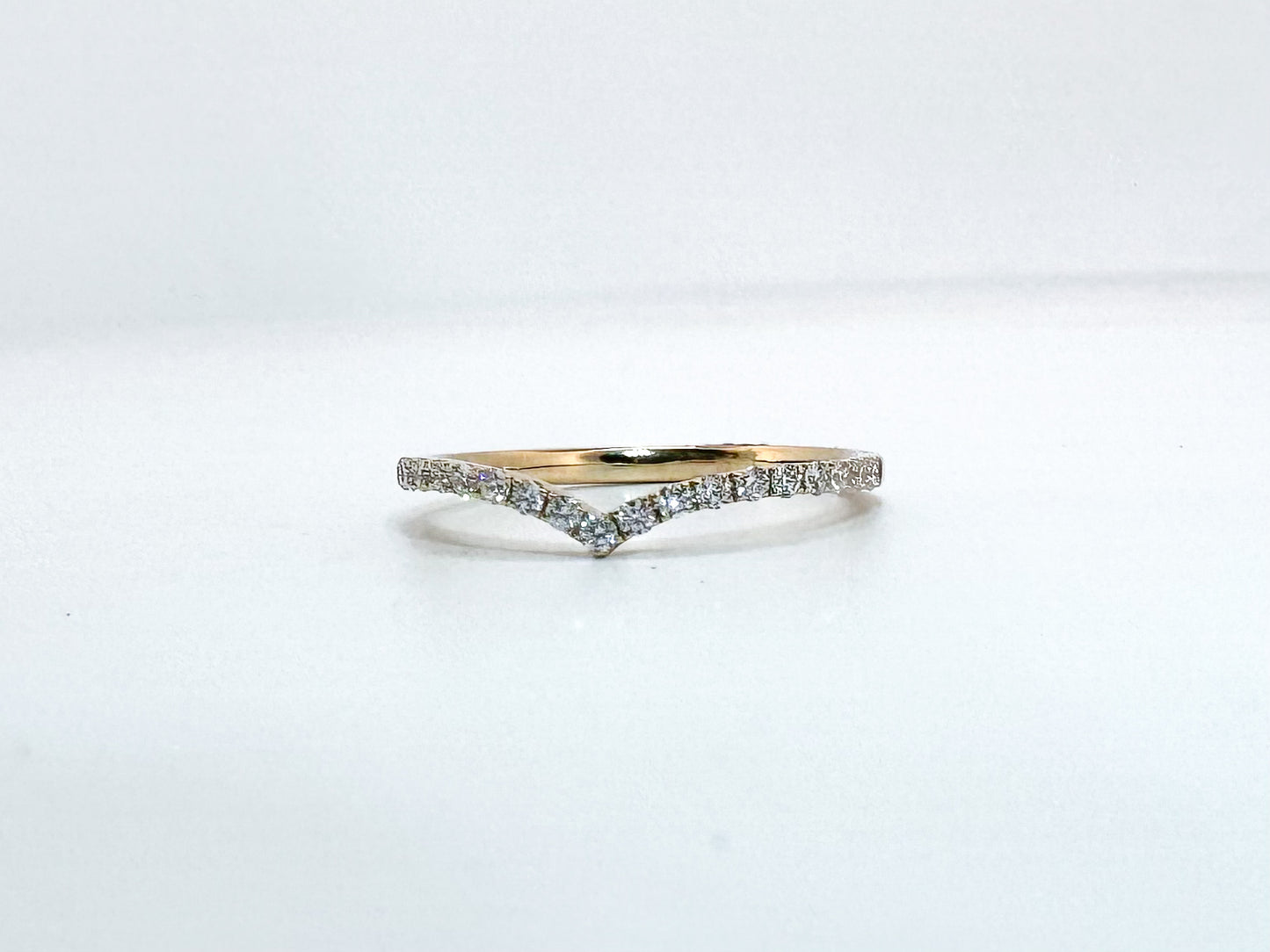 14k, yellow gold .21 diamond total weight, wedding band.