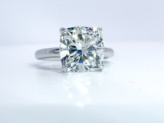 14k, White gold, 5.02 lab grown cushion cut diamond set in solitaire. IGI certified
